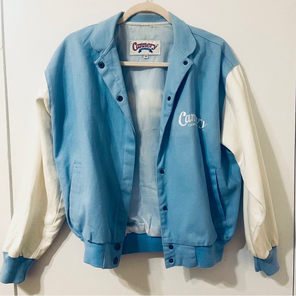 Baby blue and white varsity jacket